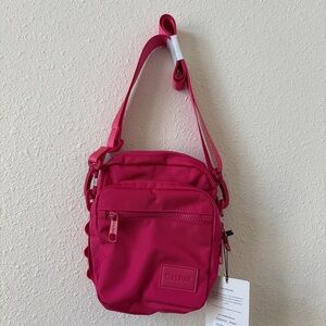 Calpak Stevyn Mini Crossbody Bag in Dragon Fruit